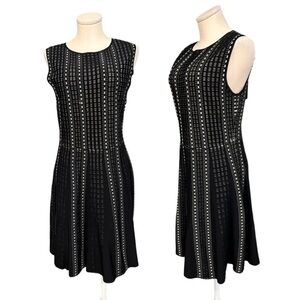 LUXE by CARMEN MARC VALVO black and nude fit and flare knit dress